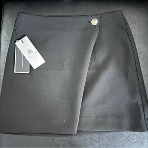 Aritzia black skirt, size 0, new with tags